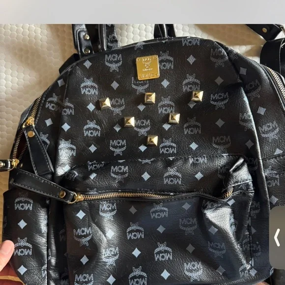 MCM | Bags | Mcm Black Backpack With Gold Accents | Poshmark display picture 1